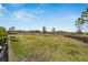 Expansive green space with bench, offering a serene environment at 3186 Oyster Cove St, Wimauma, FL 33598