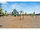 Community playground featuring swings, slides, and climbing structures at 3186 Oyster Cove St, Wimauma, FL 33598