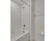 Shower stall features white subway tile, a shower head, and updated fixtures at 3186 Oyster Cove St, Wimauma, FL 33598