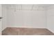 Walk-in closet with carpet flooring and a wire shelving system for storage at 3186 Oyster Cove St, Wimauma, FL 33598