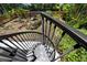 View of a backyard from a spiral staircase at 350 Kentucky Ave, Crystal Beach, FL 34681