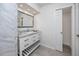 Marble-look tiled bath with modern fixtures and stylish vanity at 350 Kentucky Ave, Crystal Beach, FL 34681