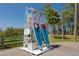 Paddleboards with life vests available for water activities with rack in the park at 350 Kentucky Ave, Crystal Beach, FL 34681