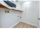 Utility room or storage area with open shelving and white walls at 350 Kentucky Ave, Crystal Beach, FL 34681