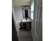 This bathroom features a new vanity, toilet, and neutral paint at 3614 E Grove St, Tampa, FL 33610