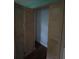 A spacious closet with bi-fold doors provides lots of storage space at 3614 E Grove St, Tampa, FL 33610