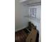 View of a closet featuring shelves and hardwood floors at 3614 E Grove St, Tampa, FL 33610