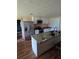 Modern kitchen with granite countertops, stainless steel appliances, and ample cabinet space at 3614 E Grove St, Tampa, FL 33610