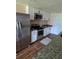 Kitchen featuring stainless steel appliances, granite countertops, and ample storage at 3614 E Grove St, Tampa, FL 33610