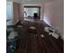 Spacious living room with hardwood floors, open layout, and natural light at 3614 E Grove St, Tampa, FL 33610
