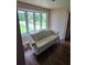 Bright living room with large window and hardwood floors at 3614 E Grove St, Tampa, FL 33610