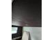 A dark textured ceiling above walls, one with a window, in a room needing repair at 3614 E Grove St, Tampa, FL 33610
