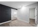 An empty living room showing flooring and freshly painted walls at 3632 E Comanche Ave, Tampa, FL 33610