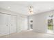 Bright bedroom features neutral carpet, ceiling fan and double windows for great natural light at 4016 Windtree Dr, Tampa, FL 33624