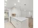 Updated kitchen with a central island offers ample counter space at 4016 Windtree Dr, Tampa, FL 33624