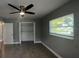 Bedroom showcasing tile floors, a closet, and a ceiling fan for added comfort at 4374 32Nd N Ter, St Petersburg, FL 33713