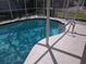 Inviting in-ground swimming pool with a ladder and refreshing blue water at 4374 32Nd N Ter, St Petersburg, FL 33713