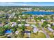 Picturesque aerial view of a residential community near a beautiful lake and waterway at 4379 Porpoise Se Dr, St Petersburg, FL 33705