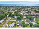 Expansive aerial view showcasing a charming neighborhood near the tranquil ocean at 4379 Porpoise Se Dr, St Petersburg, FL 33705