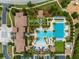 Aerial view of resort style community pool with a large recreational pool and slide at 4383 Ortona Ln, Wesley Chapel, FL 33543