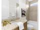 Bathroom featuring a granite countertop vanity, shower/tub combo, and modern fixtures at 4383 Ortona Ln, Wesley Chapel, FL 33543