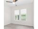 Bedroom featuring carpet floors, natural light, and privacy shades at 4383 Ortona Ln, Wesley Chapel, FL 33543