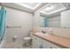 Bathroom featuring a vanity with a sink, toilet, and shower at 5155 9Th N Ave # 311, St Petersburg, FL 33710