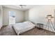 Bedroom with neutral walls, carpet, and balcony with a view at 5155 9Th N Ave # 311, St Petersburg, FL 33710