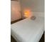 Bedroom with bedside table and closet doors at 5155 9Th N Ave # 311, St Petersburg, FL 33710
