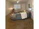 A modern living room featuring a chaise lounge, a large window, and contemporary decor at 5155 9Th N Ave # 311, St Petersburg, FL 33710