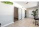 Bright living space with tile flooring, sliding glass doors, and neutral paint at 5155 9Th N Ave # 311, St Petersburg, FL 33710