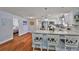 Bright and airy kitchen showcases modern appliances and a breakfast bar with pendant lighting at 540 Firefly Ln, Apollo Beach, FL 33572
