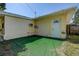 Backyard with grass and door at 5483 37Th N Ave, St Petersburg, FL 33710