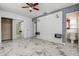 Spacious bedroom featuring ensuite bathroom, closet, and modern accent wall at 5483 37Th N Ave, St Petersburg, FL 33710