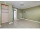 Neutral bedroom with a closet and tile flooring at 5483 37Th N Ave, St Petersburg, FL 33710