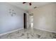 Bedroom with ceiling fan, open closet and tiled floors at 5483 37Th N Ave, St Petersburg, FL 33710