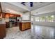 Modern kitchen and living room featuring stainless steel appliances and open layout at 5483 37Th N Ave, St Petersburg, FL 33710