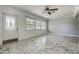 Bright living room with a decorative front door and large windows at 5483 37Th N Ave, St Petersburg, FL 33710