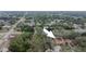 Captivating aerial view highlighting this property's ideal location in a quiet, tree-lined neighborhood at 5533 Golden Nugget Dr, Holiday, FL 34690