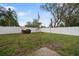 Enjoy a private backyard featuring a well-maintained lawn and a charming barbecue area, ideal for outdoor entertainment at 5533 Golden Nugget Dr, Holiday, FL 34690