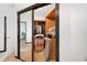 Walk-in closet with mirrored doors and wood shelving provides ample storage space at 5533 Golden Nugget Dr, Holiday, FL 34690