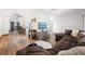 Spacious living room with hardwood floors and a comfortable seating area at 5533 Golden Nugget Dr, Holiday, FL 34690