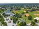 Wide aerial view of park featuring baseball fields, tennis courts, parking areas, and grassy areas at 6195 28Th N Ave, St Petersburg, FL 33710