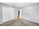 Cozy bedroom with carpet and closet, painted with a calming neutral gray color at 6195 28Th N Ave, St Petersburg, FL 33710