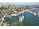 Picturesque marina view with boats, docks, and city skyline in the distance on a clear, sunny day at 660 Island Way #206 # 206, Clearwater, FL 33767