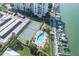 Overhead view of the community pool, tennis court, and boat slips at 660 Island Way #206 # 206, Clearwater, FL 33767