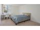 A basic bedroom with a desk under the window and a view at 660 Island Way #206 # 206, Clearwater, FL 33767