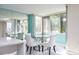 Bright dining area with large windows and views overlooking the area at 660 Island Way #206 # 206, Clearwater, FL 33767
