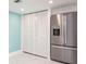 Modern kitchen with stainless steel refrigerator and ample storage at 660 Island Way #206 # 206, Clearwater, FL 33767
