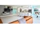 Condo living room with breakfast bar, dining area and modern design features at 660 Island Way #206 # 206, Clearwater, FL 33767